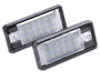 Two rectangular LED lights with a textured surface, positioned overlapping. The units are encased in clear plastic and set against a white background.