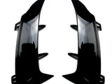 Two glossy black car bumper fins are facing each other, designed to be attached via clips. They are positioned on a plain white background.