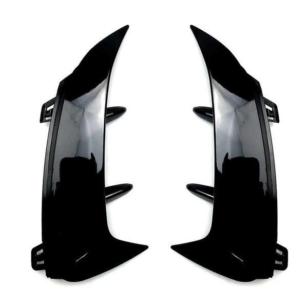 Two glossy black car bumper fins are facing each other, designed to be attached via clips. They are positioned on a plain white background.