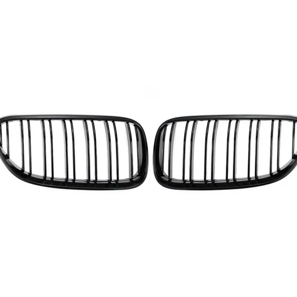 Two black kidney-shaped car grilles with vertical slats are positioned side by side against a plain white background.