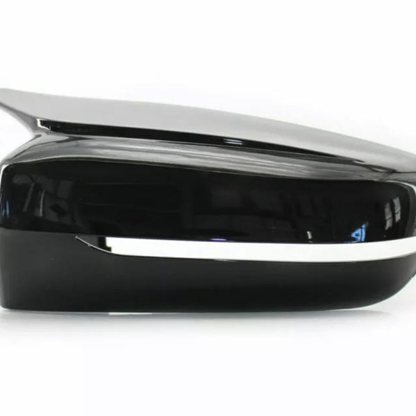 A sleek black side mirror with a chrome strip runs horizontally along its edge, set against a plain white background.