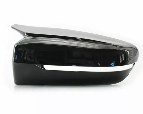 A sleek black side mirror with a chrome strip runs horizontally along its edge, set against a plain white background.