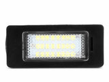 A rectangular LED light with multiple small yellow diodes is set in a black casing, suitable for automotive use, photographed against a white background.