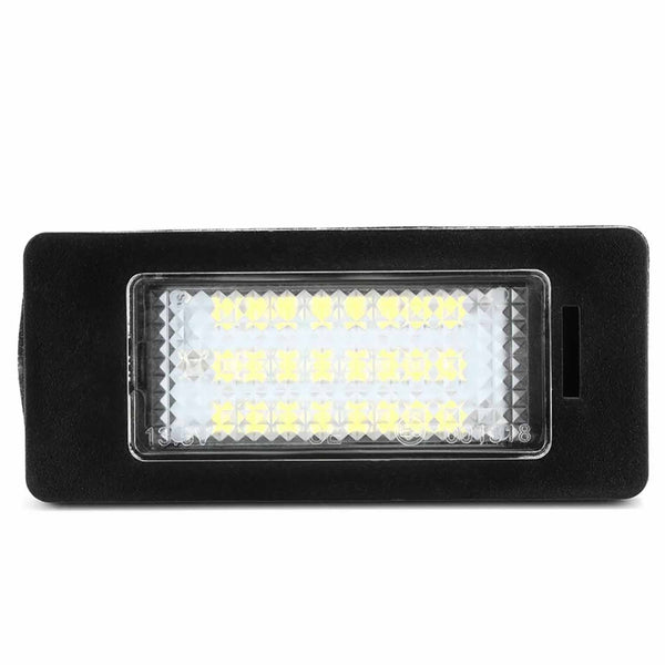 A rectangular LED light with multiple small yellow diodes is set in a black casing, suitable for automotive use, photographed against a white background.