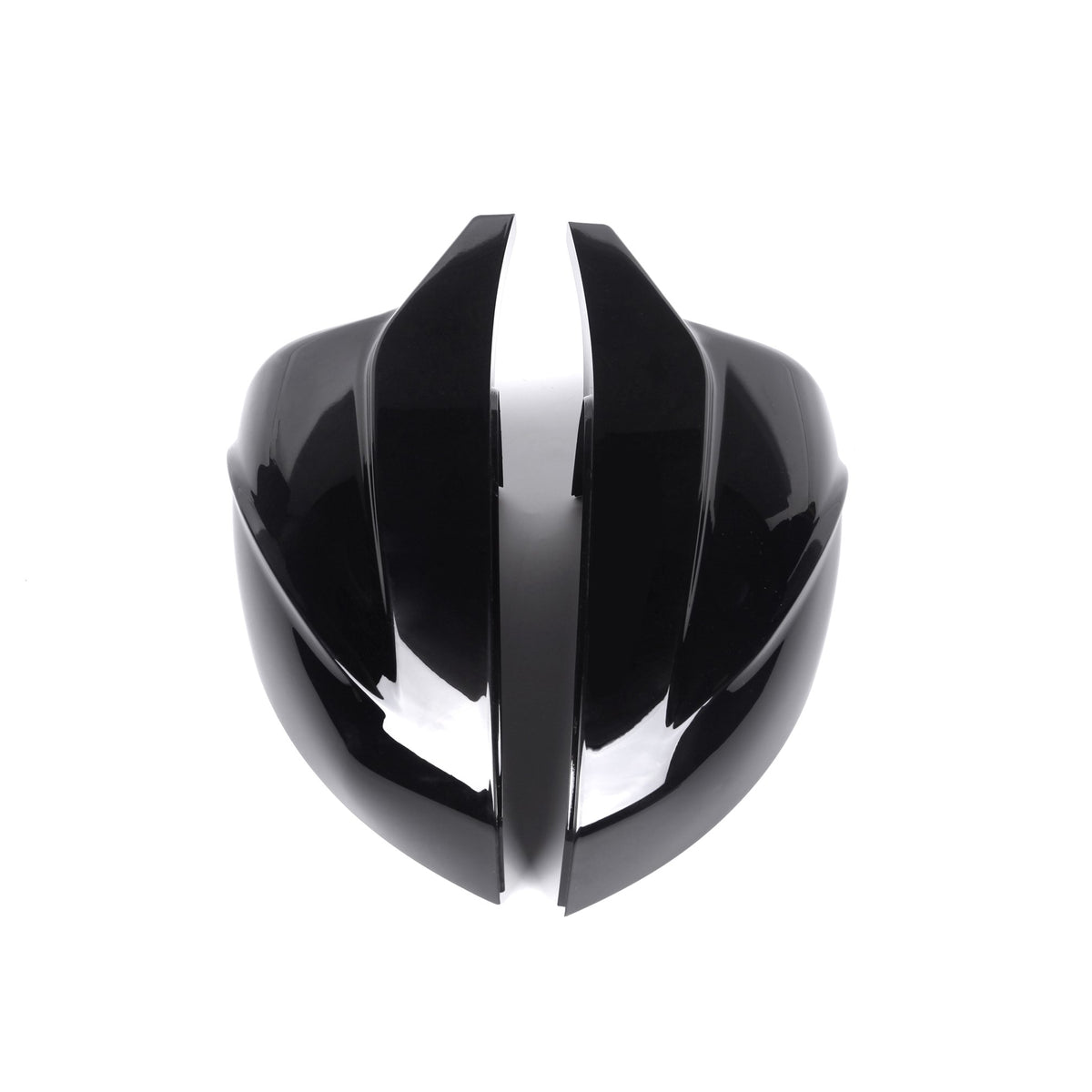 A shiny, black, futuristic helmet with sleek, curved shapes is split down the middle, placed against a plain white background.