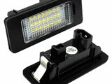Rectangular LED car light with multiple small bulbs, set within a black frame. The reverse side shows connectors and a 
