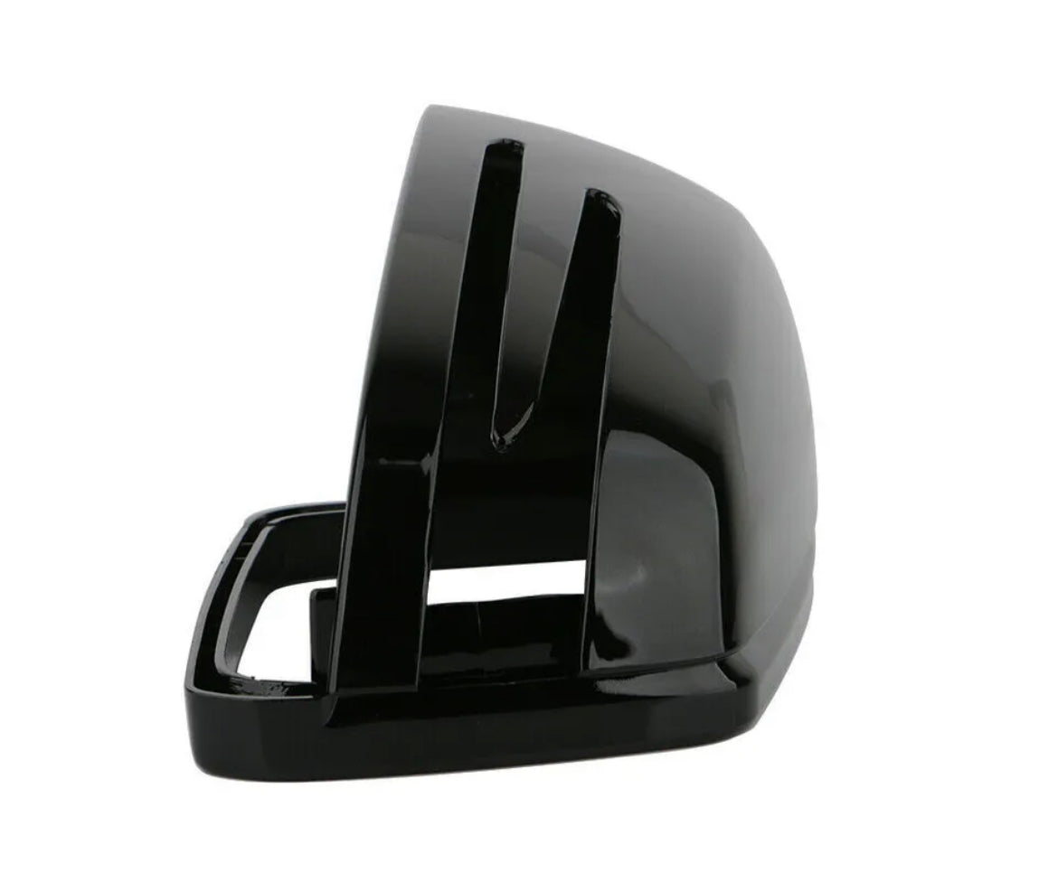 A shiny black plastic car side mirror cover with a sleek design is standing upright against a plain white background.