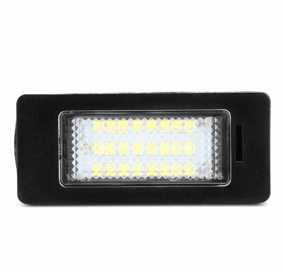 Rectangular LED panel with multiple small yellow lights is illuminated, housed in a black frame, designed for bright, efficient illumination in technological or automotive environments.