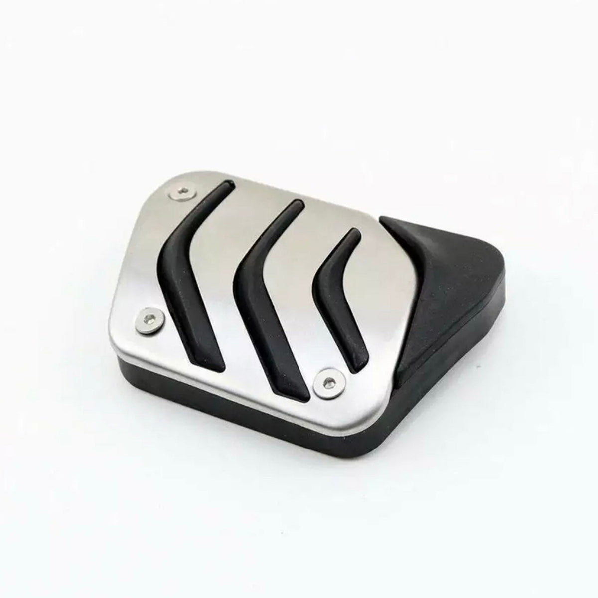 A metal car pedal features three black grooves and a black rubber edge, resting on a white background.