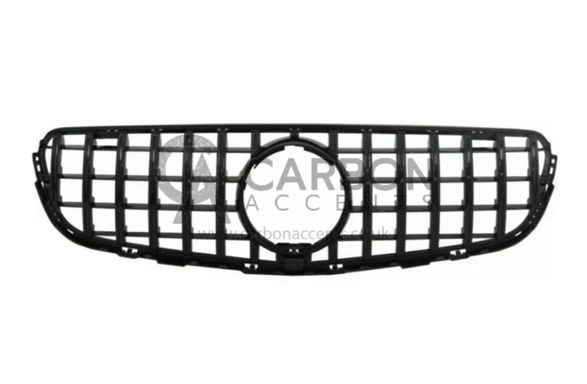 A black, rectangular automotive grille with a honeycomb design, centered round opening, displayed against a white background. Text overlay reads: "CARBON ACCENTS www.carbonaccents.co.uk".