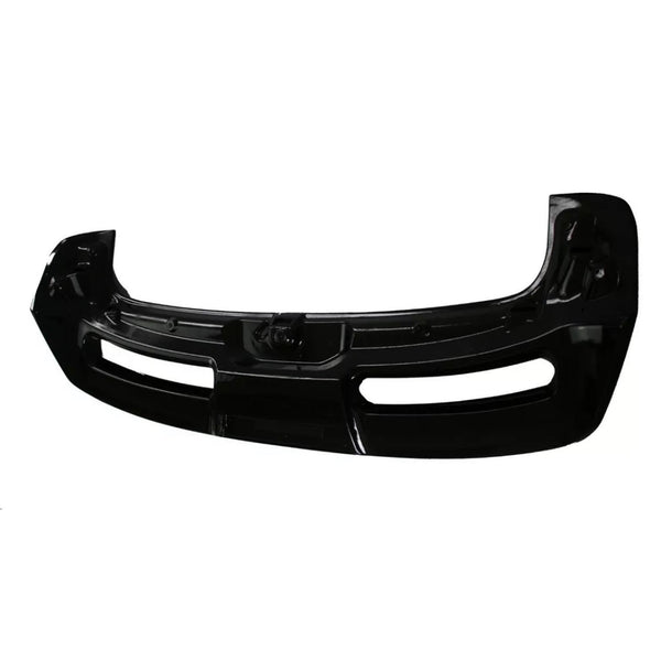 A black car bumper, featuring two large air vents, lies against a plain white background, highlighting its sleek, curved design.