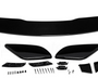Car spoiler kit with black aerodynamic components laid out on a white surface. Includes a large wing, side pieces, and multiple small parts and screws for assembly.