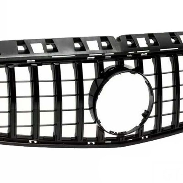 Black car grille with a rectangular grid pattern and a circular emblem space in the center, situated against a plain white background.