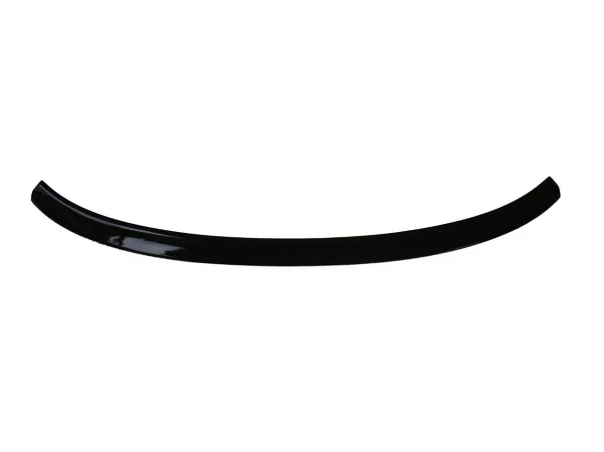 A glossy, black, curved plastic or metal strip shown on a plain white background, resembling a car spoiler or trim piece.