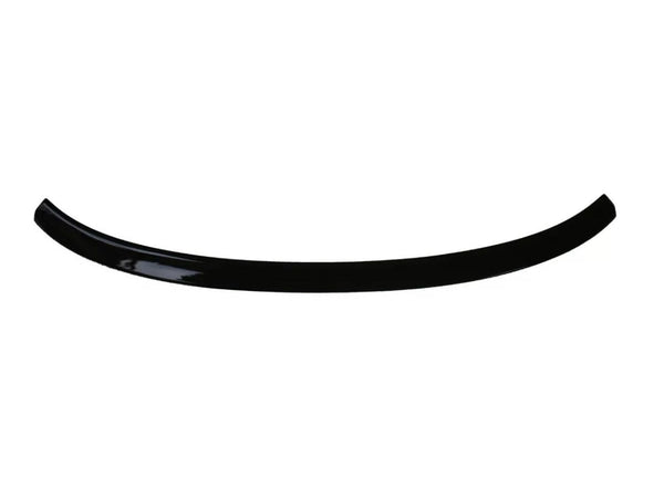 A glossy, black, curved plastic or metal strip shown on a plain white background, resembling a car spoiler or trim piece.