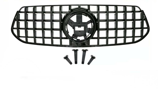 A black vehicle grille with a lattice design includes four mounting brackets below. The grille features a central circular emblem space, set against a plain background.