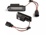 Rectangular LED car lights arranged on a white background, displaying multiple small bulbs within each unit. Two units are shown, each with attached red and black wires and connectors.