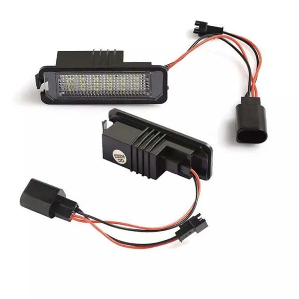 Rectangular LED car lights arranged on a white background, displaying multiple small bulbs within each unit. Two units are shown, each with attached red and black wires and connectors.