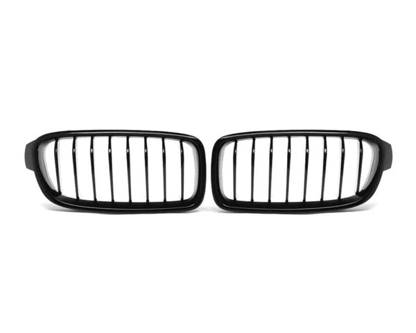 A pair of black, vertical-bar car grilles is placed on a plain white background, positioned side by side.