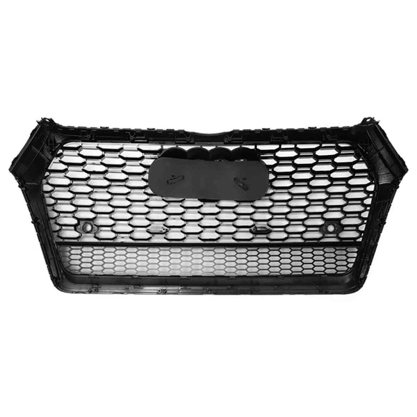 A black car grille with a hexagonal mesh pattern is placed against a white background. It has a central oval badge plate with two screw holes.