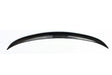 A glossy, black carbon fiber car spoiler arcs gracefully, displayed against a plain white background, highlighting its sleek and aerodynamic design.