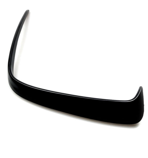 A black, curved car spoiler sits against a plain white background, highlighting its smooth, aerodynamic shape designed for enhancing vehicle performance.
