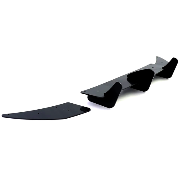 A set of black, aerodynamic fin-like car parts are laid on a white surface, suggesting components for performance vehicle modification or enhancement.