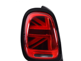 A red car taillight featuring a pattern resembling the Union Jack, displayed against a plain white background.