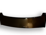 Glossy, black car spoiler is displayed against a white background, casting a faint shadow.