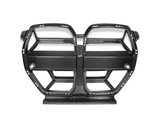 A carbon fiber car grille with a dual kidney design, featuring several rectangular openings and circular mount points, placed against a plain white background.