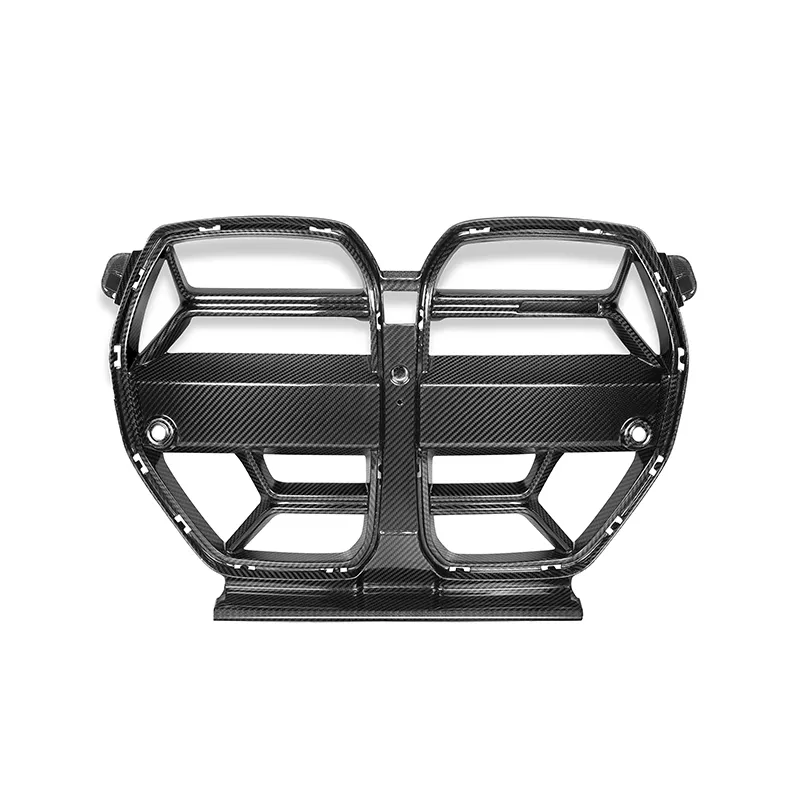 A carbon fiber car grille with a dual kidney design, featuring several rectangular openings and circular mount points, placed against a plain white background.