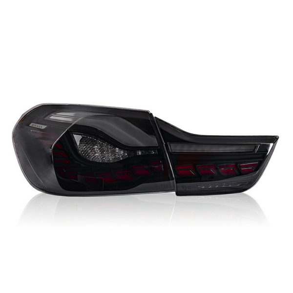 Smoky tail light assembly with red accents, placed against a plain white background, designed for vehicle rear lighting and signaling functions.
