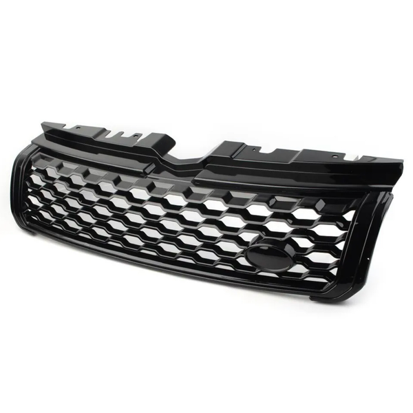 Black car grille with a honeycomb pattern, resting on a plain white surface, featuring a central oval space likely for logo placement, designed for front vehicle installation.