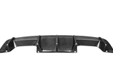 Carbon fiber car rear diffuser with aerodynamic fins is positioned with mounting holes visible, isolated on a white background.