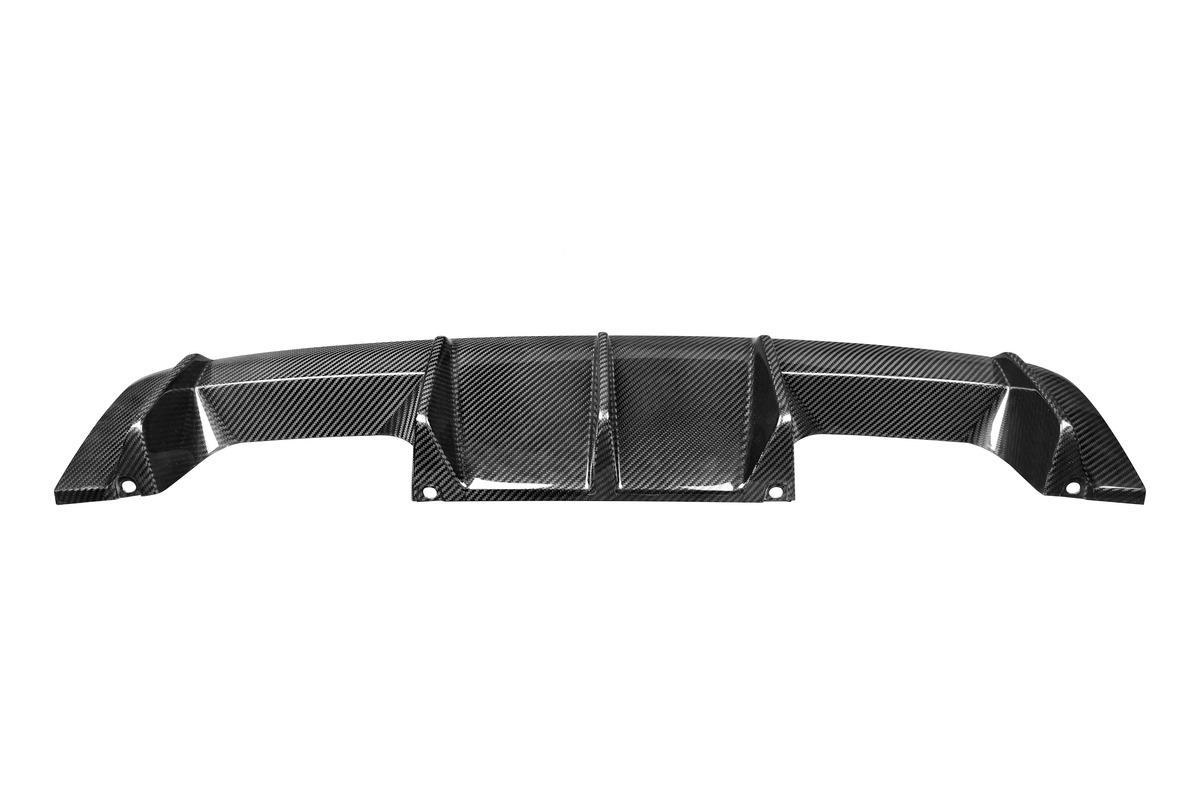 Carbon fiber car rear diffuser with aerodynamic fins is positioned with mounting holes visible, isolated on a white background.