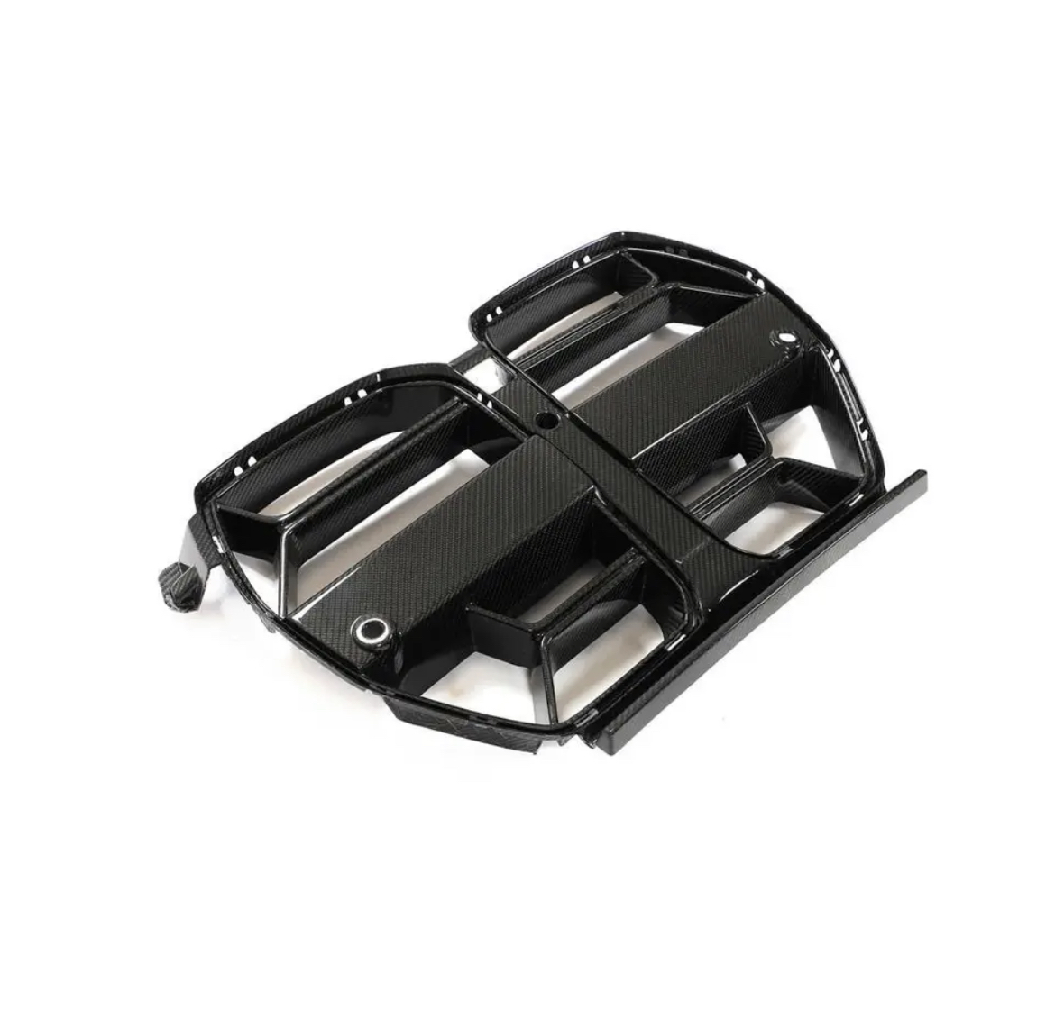 A carbon fiber car grille lies on a plain white background, showcasing its glossy finish and multiple horizontal slats.