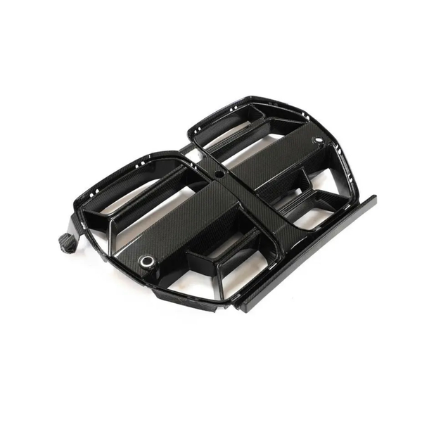 A carbon fiber car grille lies on a plain white background, showcasing its glossy finish and multiple horizontal slats.