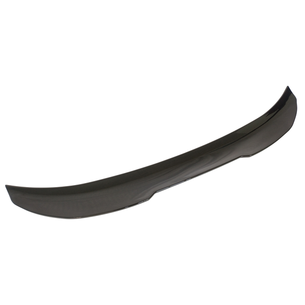 A sleek, curved car spoiler, likely made of carbon fiber, sits against a plain white background. Its aerodynamic shape suggests it is designed to enhance vehicle performance.