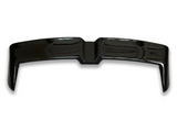A glossy black car spoiler sits on a white background, reflecting overhead lights, highlighting its sleek, curved design and aerodynamic structure.