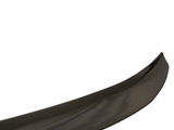 A curved, glossy, black car spoiler displayed against a plain white background, highlighting its sleek, aerodynamic design for enhanced vehicle performance.