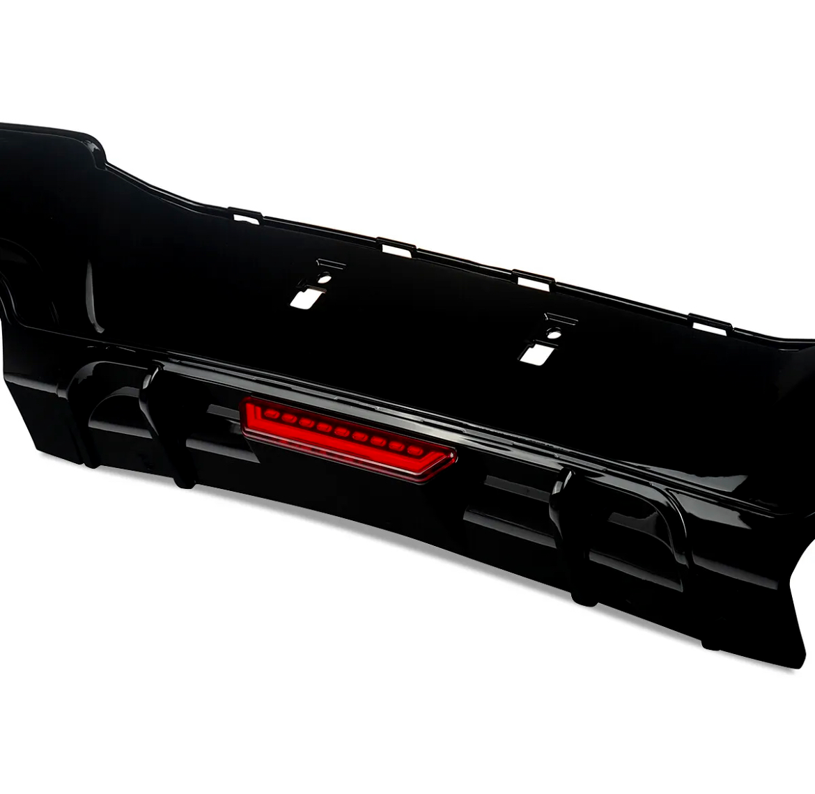 The object is a black car bumper with an integrated red reflector, resting on a white background. The design features cutouts for attachment, suitable for automotive enhancement.
