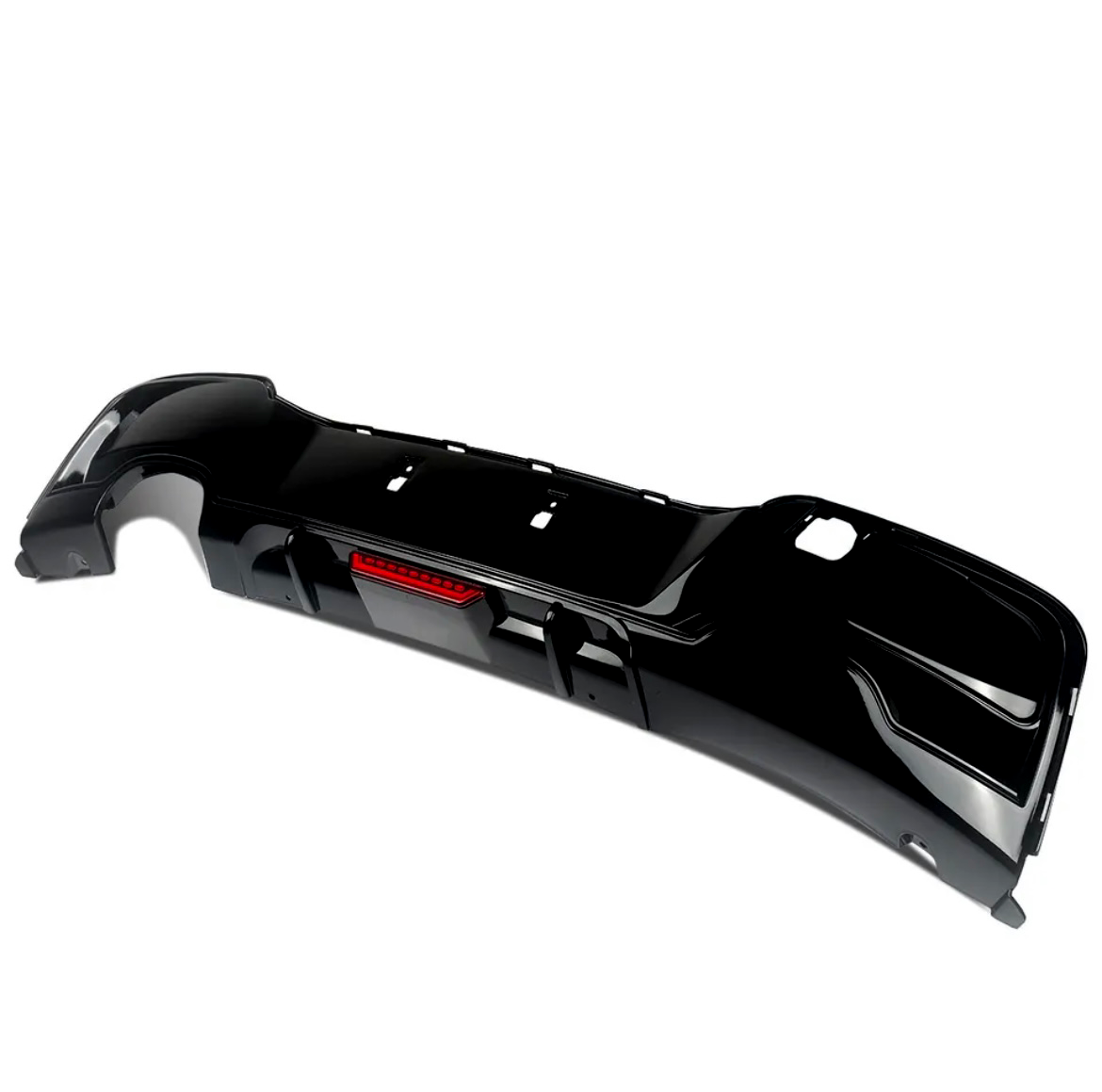 A black car bumper with a central red reflector sits isolated on a white background, featuring cutouts for attachment and a sleek, aerodynamic design.