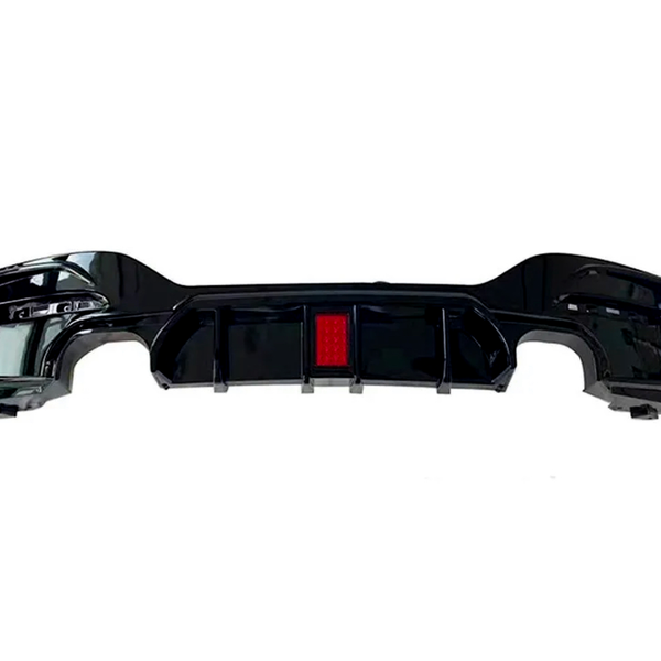 The black car bumper features a red reflector at its center, set in a plain white background, emphasizing its design details.