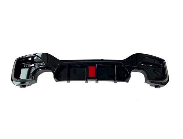 The black car bumper features a red reflector at its center, set in a plain white background, emphasizing its design details.