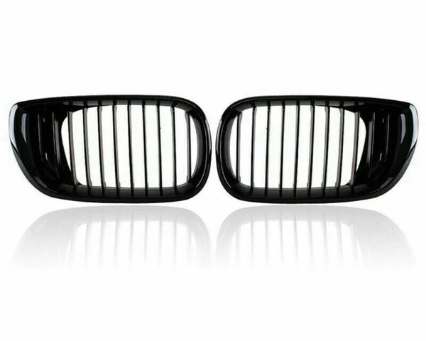 Two black car kidney grilles with vertical slats are shown against a plain white background, reflecting slightly underneath, suggesting a glossy surface.