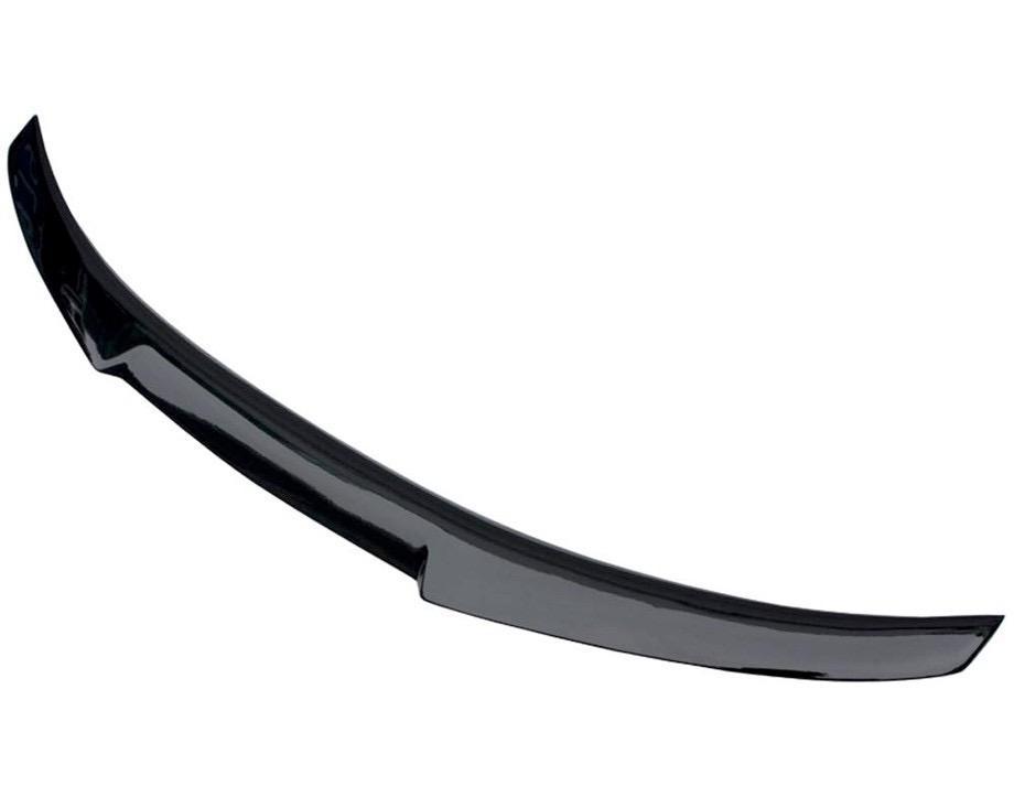 Curved black car spoiler resting on a plain white background, highlighting its aerodynamic design without visible attachments.