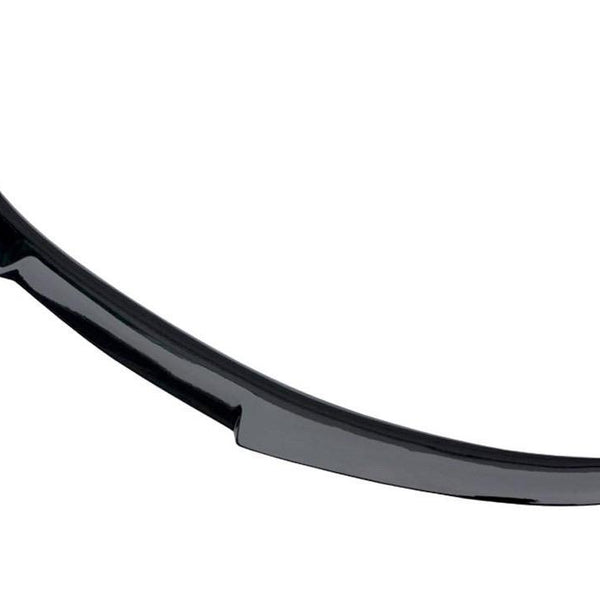 Curved black car spoiler resting on a plain white background, highlighting its aerodynamic design without visible attachments.