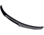 Curved black car spoiler resting on a plain white background, highlighting its aerodynamic design without visible attachments.