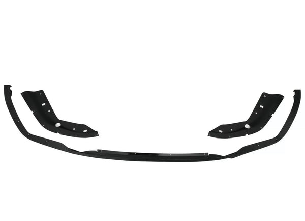 Black car body kit with curved sections and multiple drilled holes, positioned on a plain white background, suggesting automotive modification or repair use.