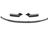 Three black car bumper pieces are laid out separately, appearing ready for assembly. They are displayed on a plain white background, showcasing their sleek, curved design.
